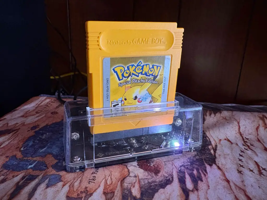 Pokémon Yellow inserted into the Game Boy Operator